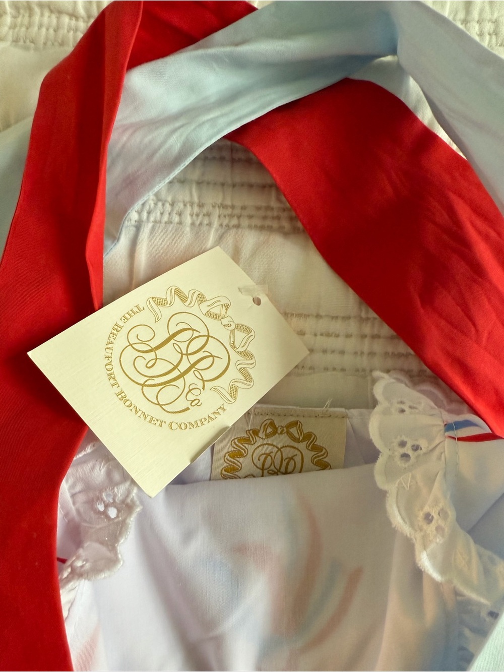 The Beaufort Bonnet Company White Baby One-Piece with Red and Blue Ribbon Detail - Picture 2 of 2